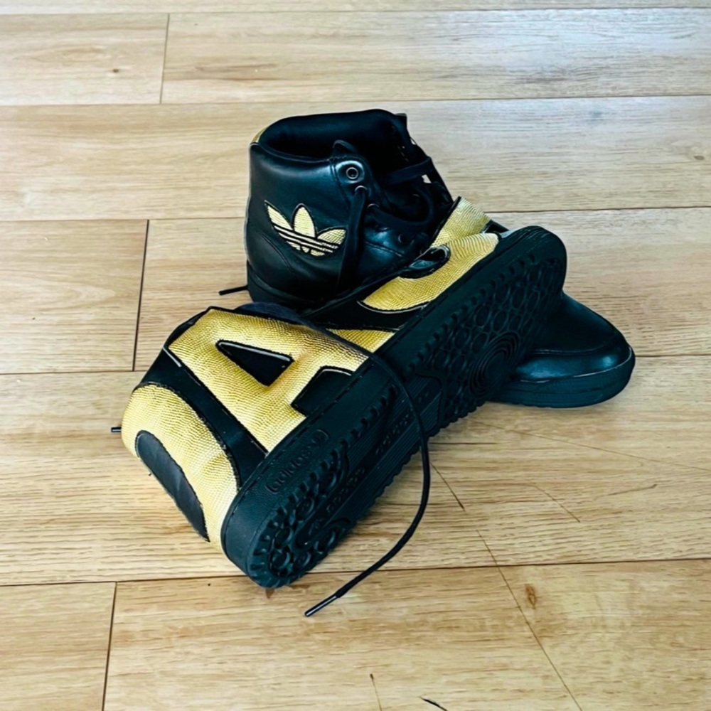 Adidas Black and Gold Sneakers Classic Low-Top Design